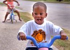 TricycleFun Jonesville copy  Torrin Foster, 2, front, rides his tricycle as he is followed by his big sister Taylor Foster, 5, back, as the siblings have fun together in Jonesville Sunday afternoon, 7-29-07. The children, of Kissimmee, FL, are spending the summer with their grandmother Rebecca Foster, in Jonesville.